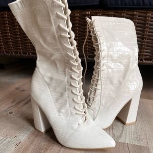 White lace up boots